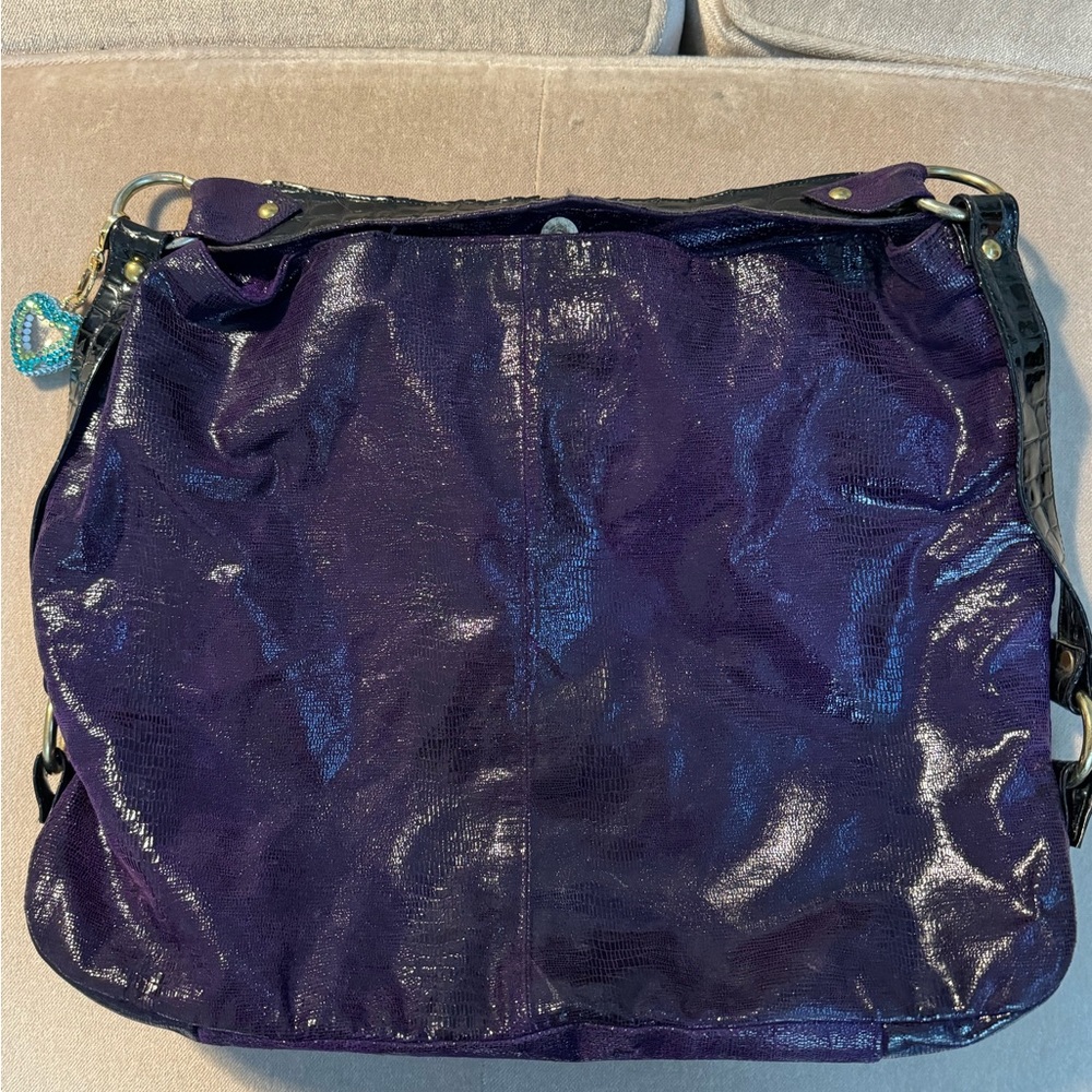 Purple soft leather  bag with heart charm-Inside clean.Some wear on handles.